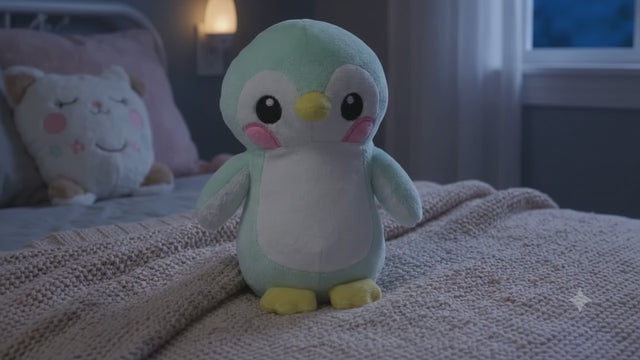 Pingüino luminoso en la cama